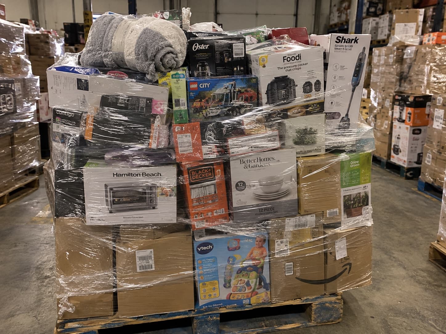 Pallet of mixed general merchandise including small appliances, toys and housewares